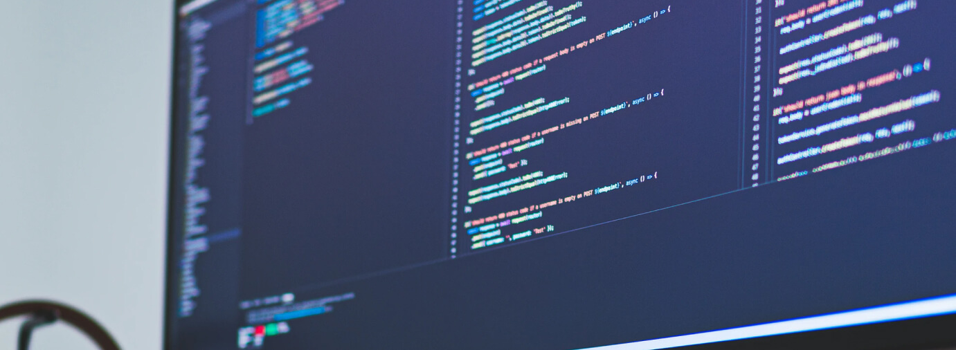 desktop computer, code on the screen