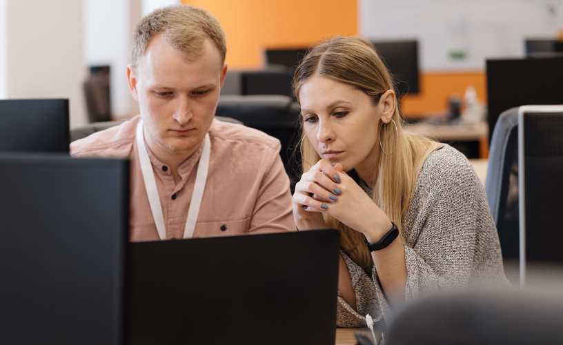 laptop, businessman and businesswoman working